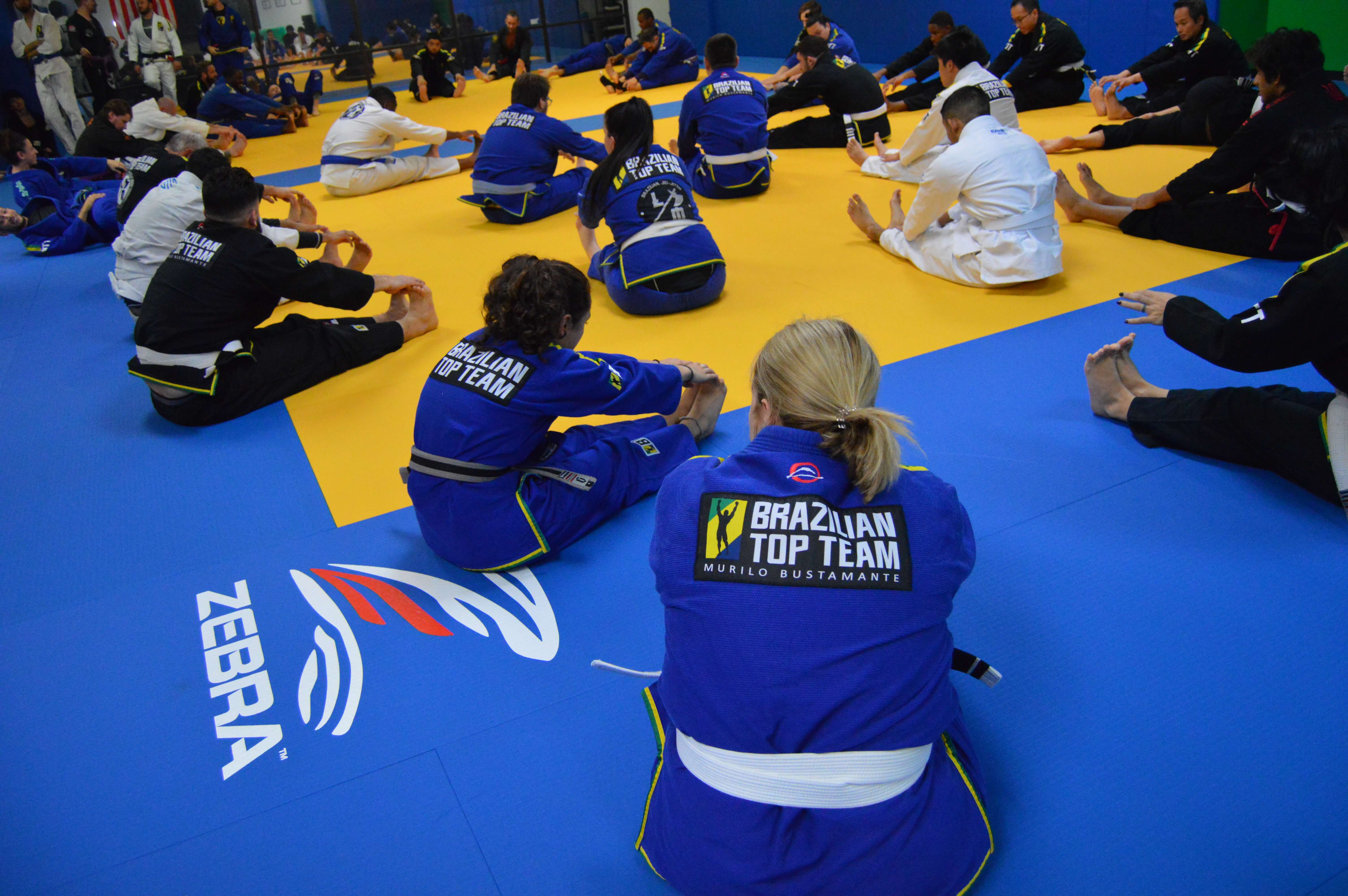 BTT Irving class stretching together on the mat